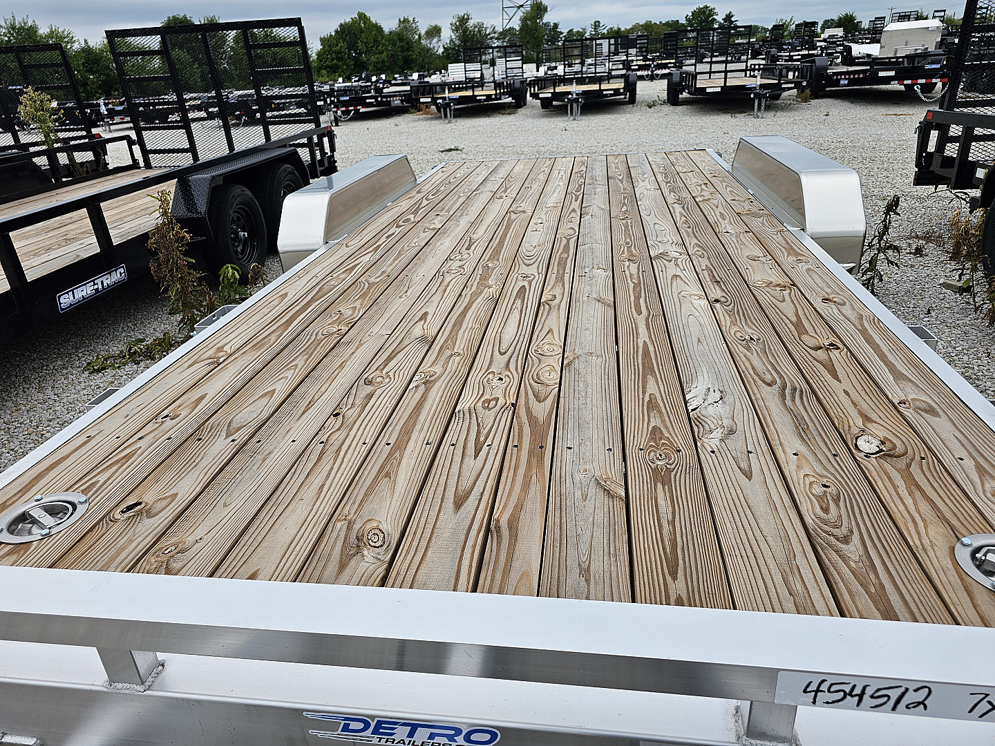 New 2025 Sure-Trac 7' x 18' (16+2) 7K Aluminum Wood Deck C-Channel Car Hauler