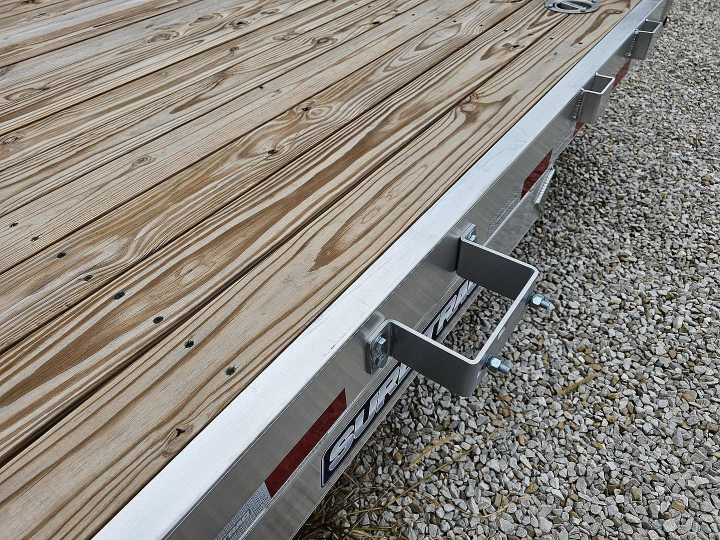 New 2025 Sure-Trac 7' x 18' (16+2) 7K Aluminum Wood Deck C-Channel Car Hauler