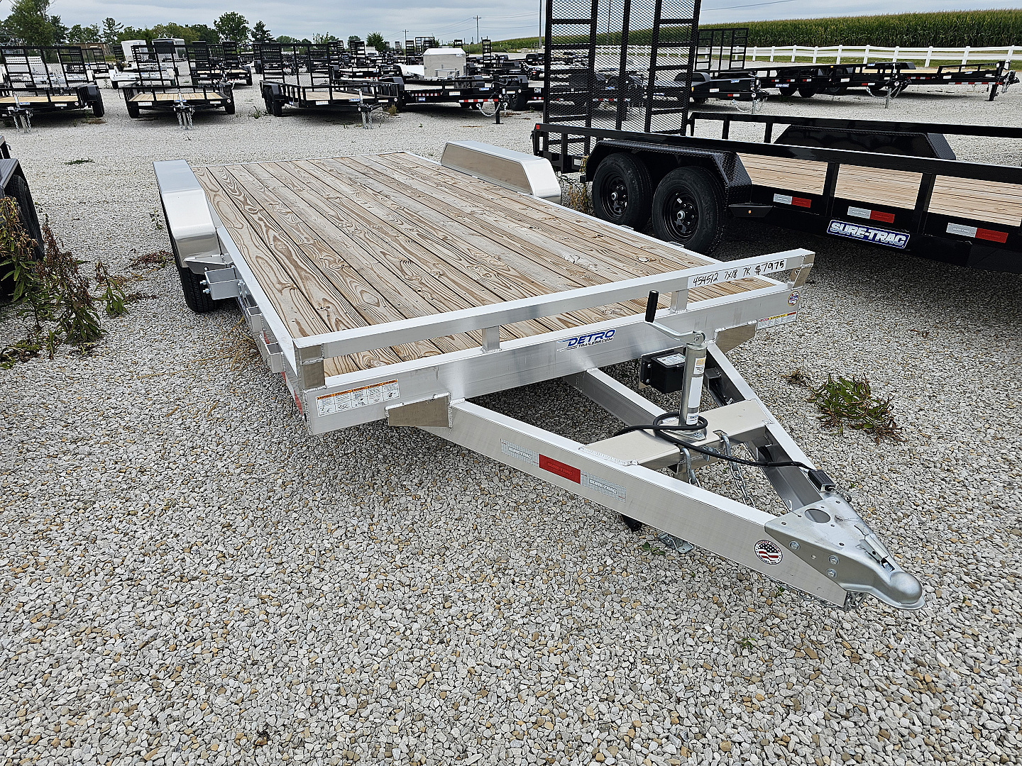 New 2025 Sure-Trac 7' x 18' (16+2) 7K Aluminum Wood Deck C-Channel Car Hauler