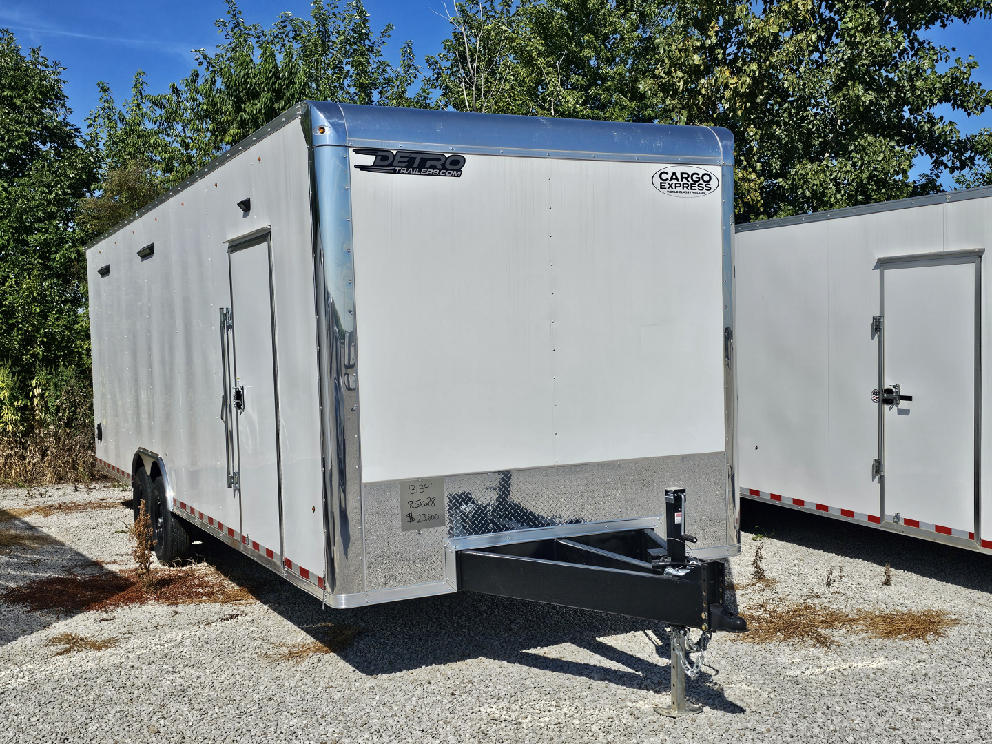 New 2025 Cargo Express XL SE 8.5" x 28' 14K Enclosed Car Hauler Trailer