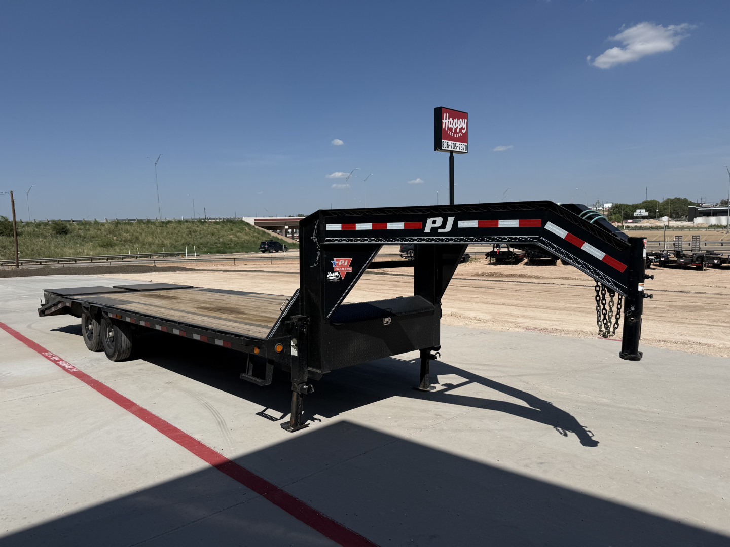 Used PJ Trailers 102"x25' Low Pro Flatdeck w/ Singles- LS