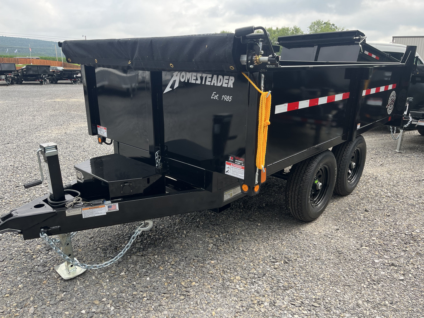 New 2026 Homesteader 6x10 Deckover Dump - 10k - Barn Doors