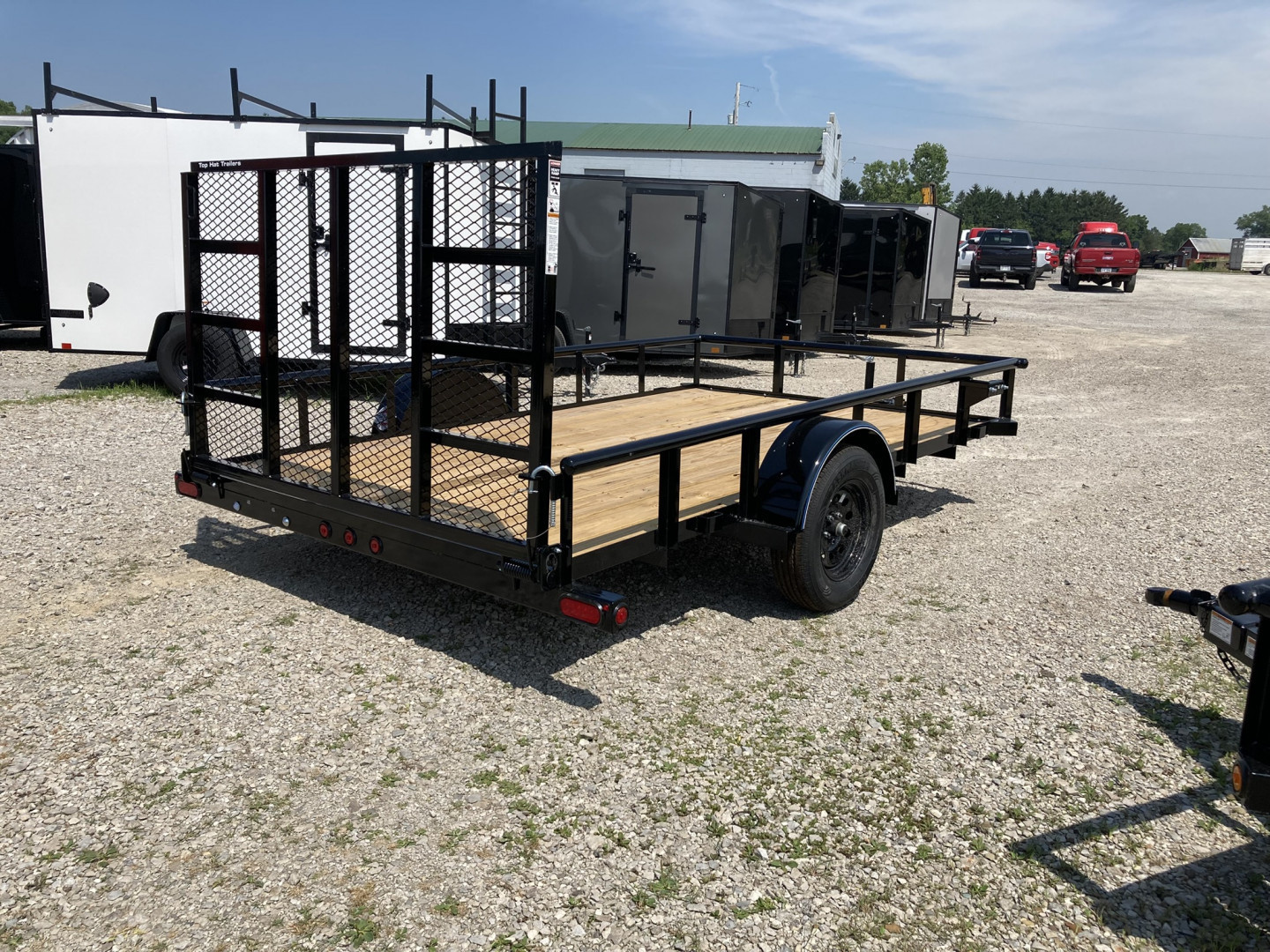 New 2025 Top Hat 83"x12' Utility Trailer