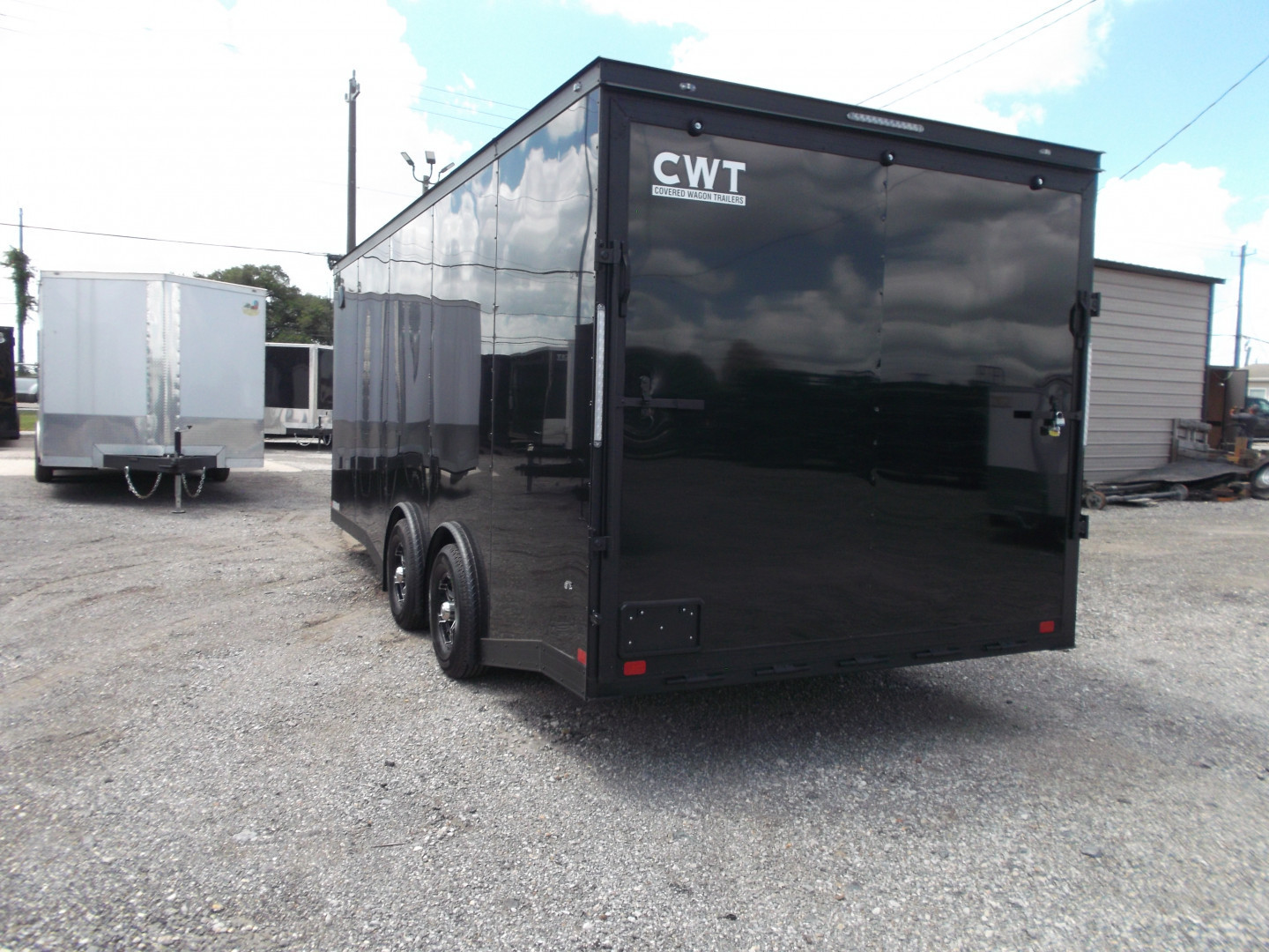 New 2025 Covered Wagon Trailers 8.5x24 Cargo / Enclosed Trailer / Car Hauler / 7ft Interior / 5200# Split Torsion Axles / 48" RV Side Door / 60" Triple Tube Tongue / .080 Black Poly Semi Screwless Exterior / Extra Wide Ramp / Mags / Black Out Package