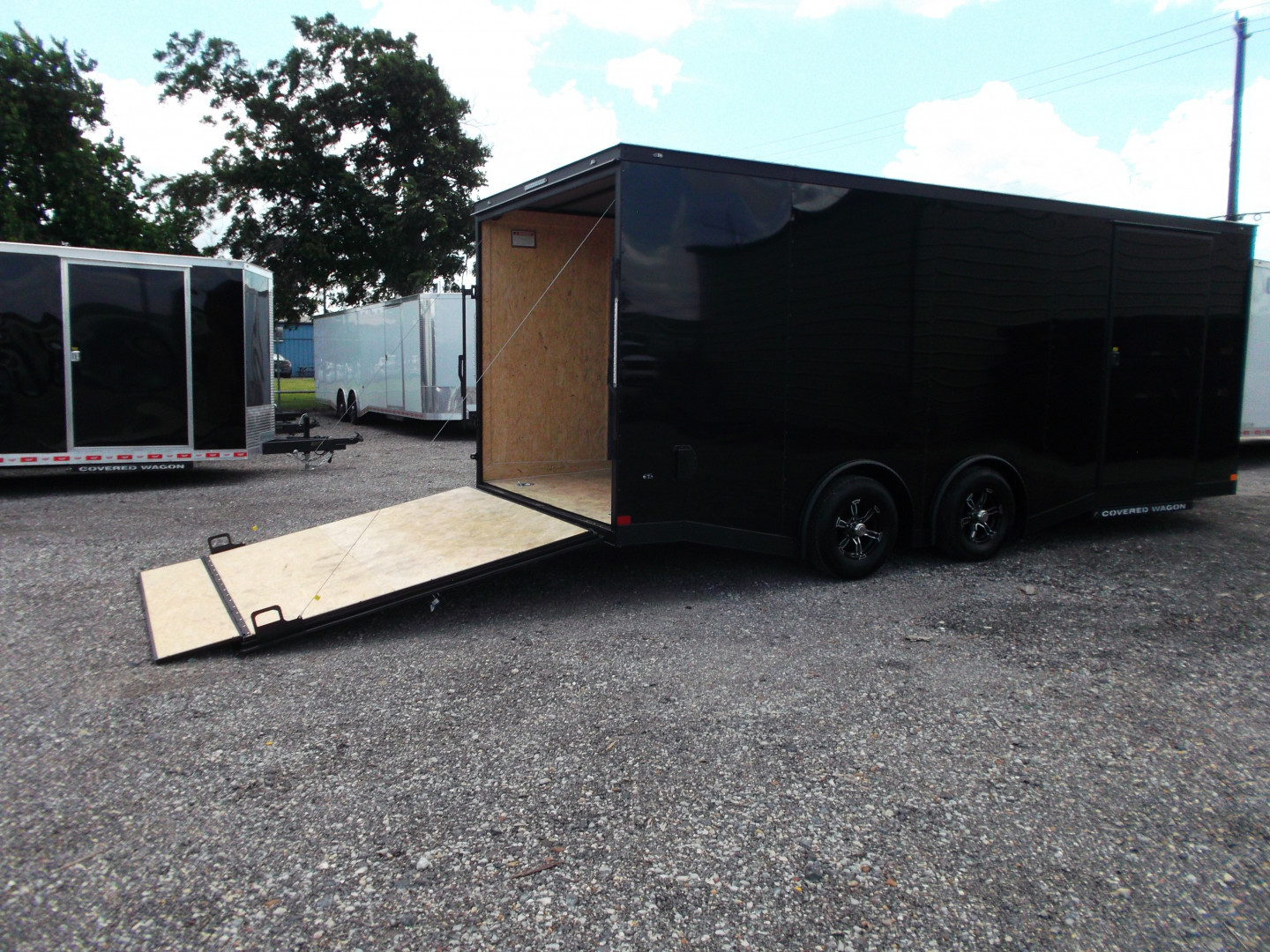New 2025 Covered Wagon Trailers 8.5x24 Cargo / Enclosed Trailer / Car Hauler / 7ft Interior / 5200# Split Torsion Axles / 48" RV Side Door / 60" Triple Tube Tongue / .080 Black Poly Semi Screwless Exterior / Extra Wide Ramp / Mags / Black Out Package
