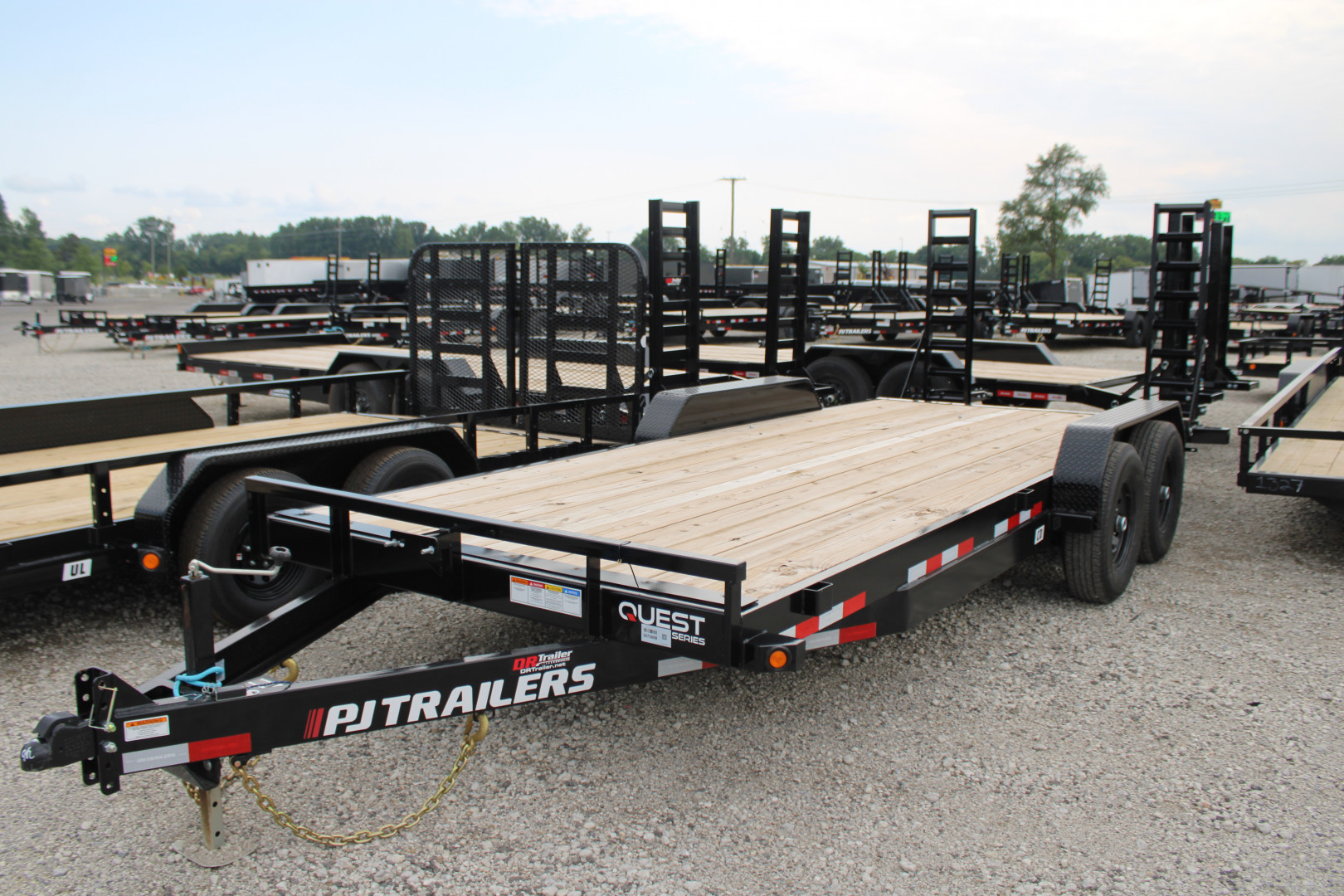 New 2026 PJ Trailers 20' FR 14K GVWR EQUIPMENT TRAILER WITH FOLDING RAMPS 49525 Equipment Trailer