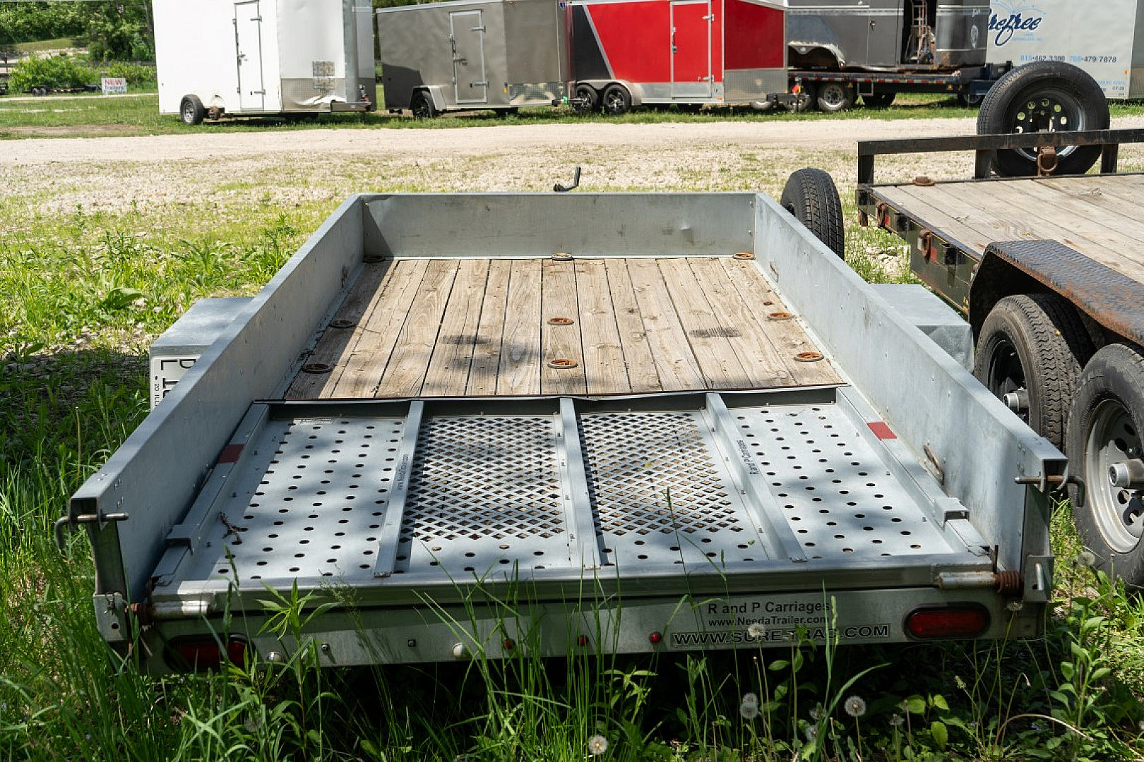 Used FOR RENT ONLY #14 Sure Trac 6x12 Galvanized Utility Trailer
