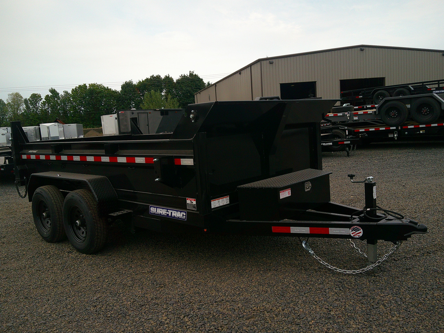 New 2025 Sure-Trac 6x10 SD Low Profile 10K Dump Trailer