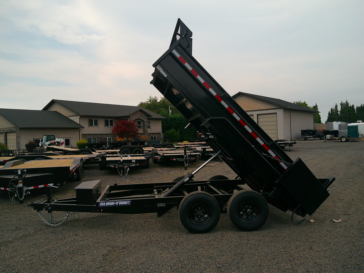 New 2025 Sure-Trac 6x10 SD Low Profile 10K Dump Trailer