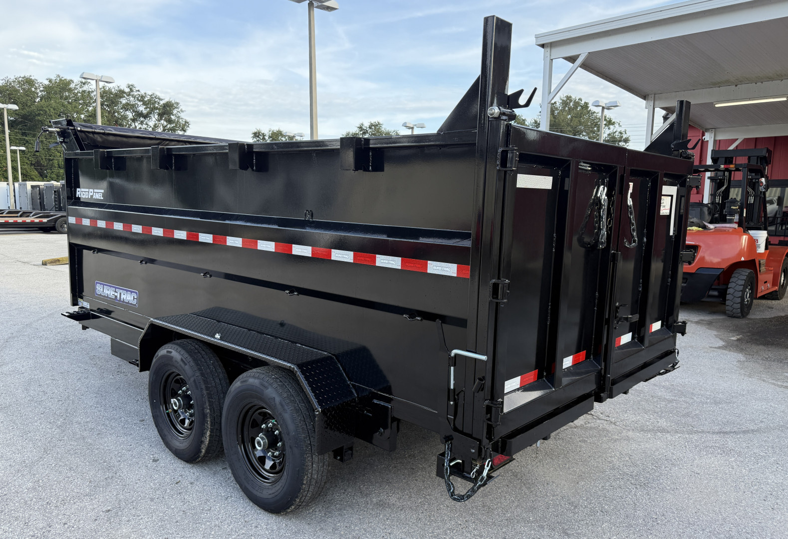 New 2025 Sure-Trac 82x14 Telescopic 4" Sided 14K Dump Trailer