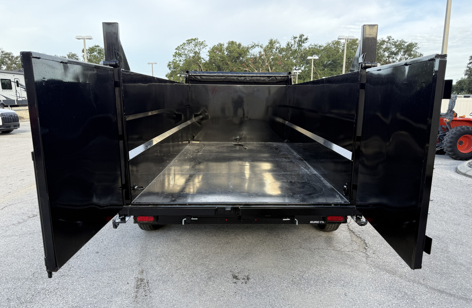 New 2025 Sure-Trac 82x14 Telescopic 4" Sided 14K Dump Trailer