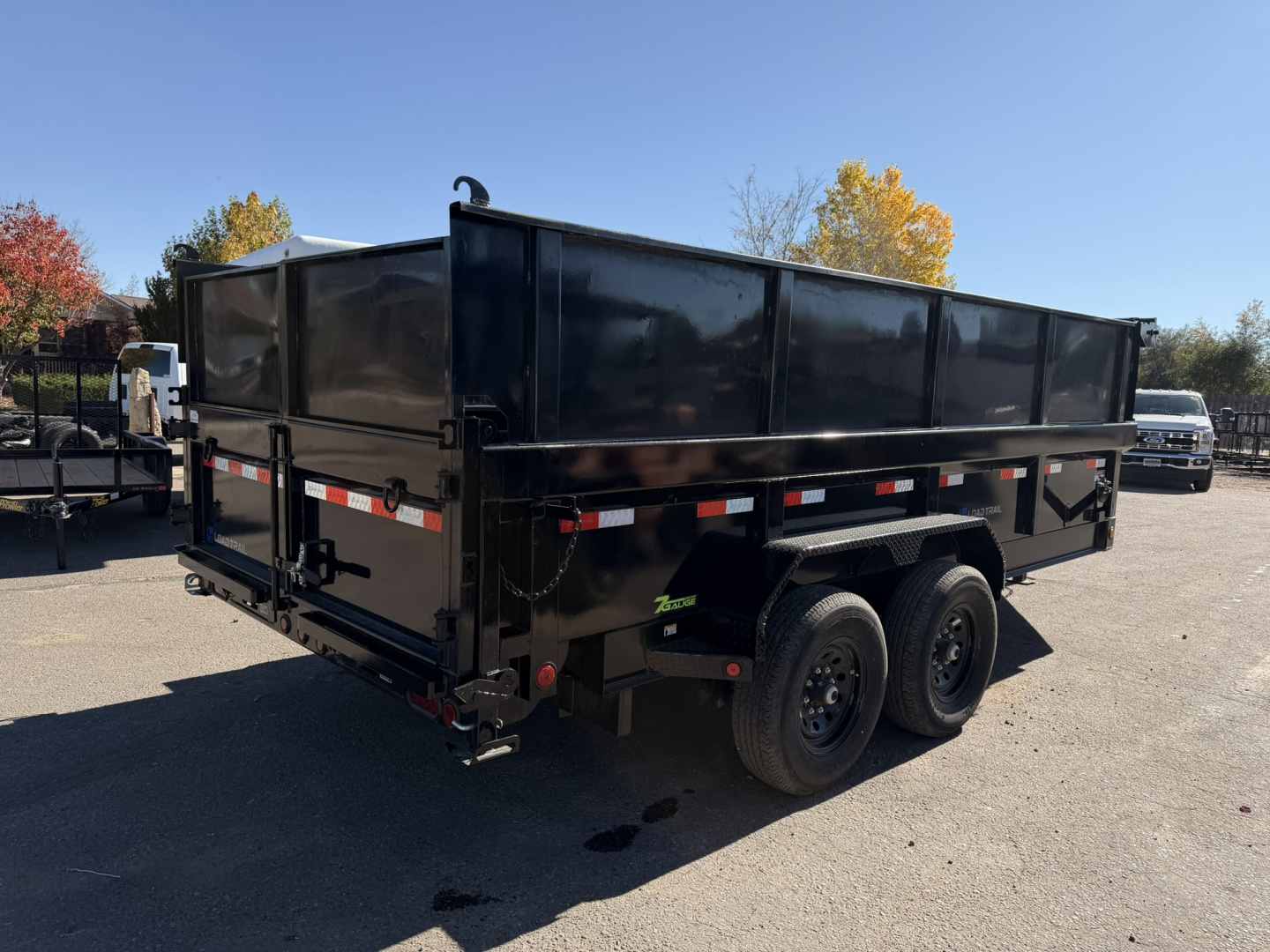 New 2025 Load Trail 7-16 Dump 7 Gauge Floor 7K Axles, W2'SideExtensions