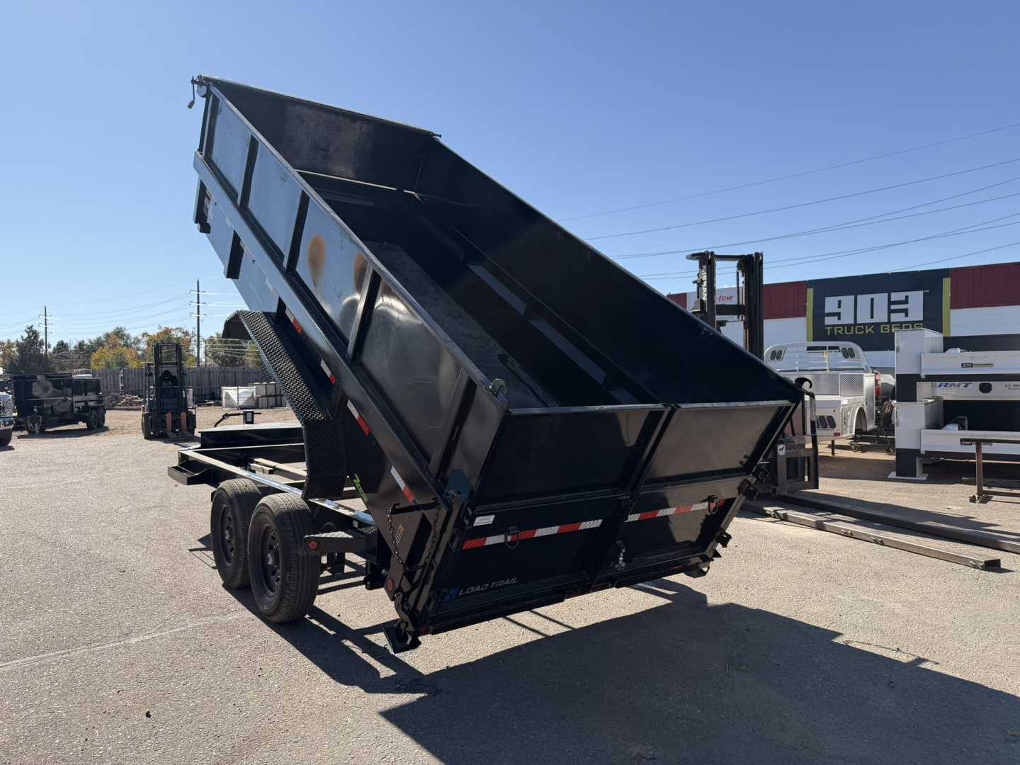 New 2025 Load Trail 7-16 Dump 7 Gauge Floor 7K Axles, W2'SideExtensions