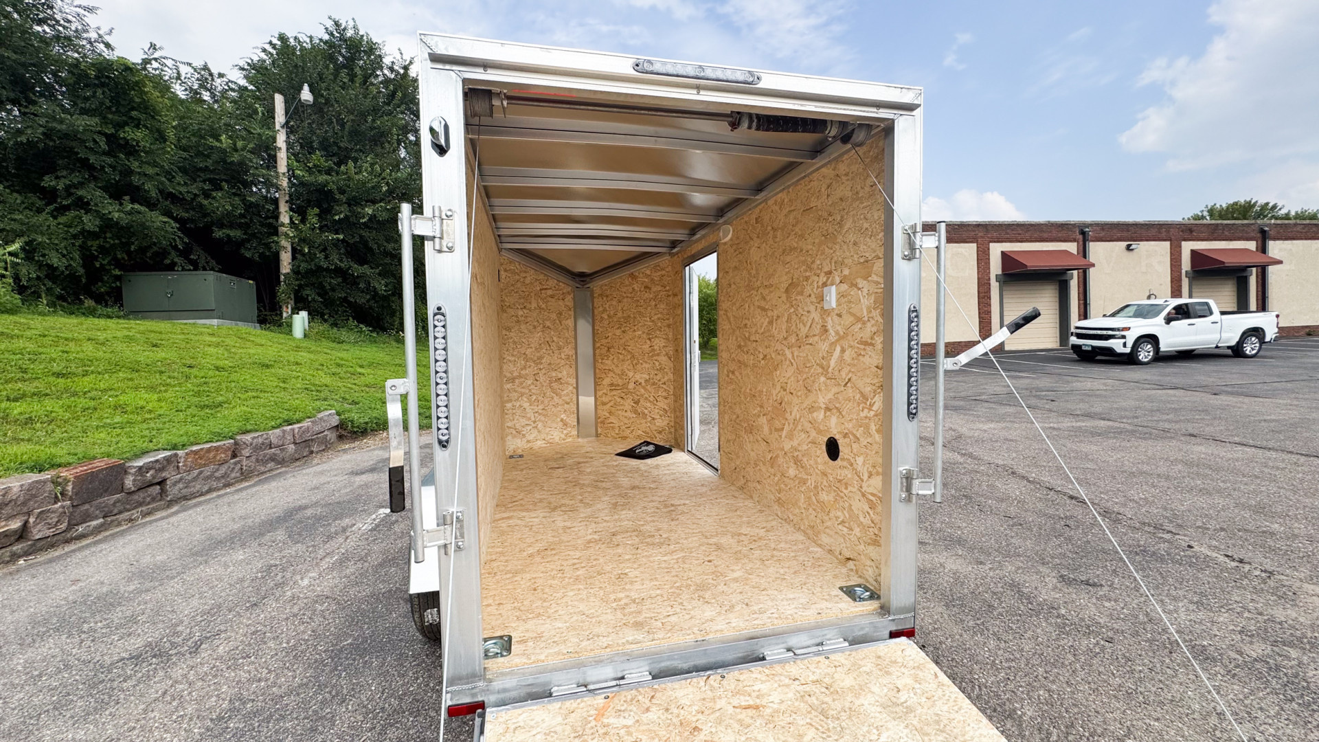 New 2025 Lightning 5X10 Enclosed Trailer - Ramp Door!