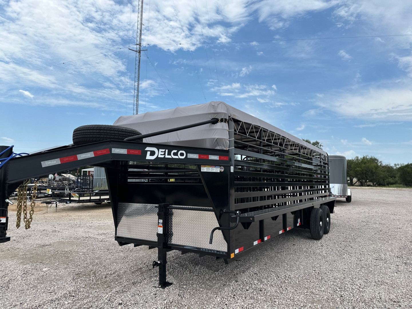 New 2026 Delco Bar Top 6'8 x 24' Stock Trailer