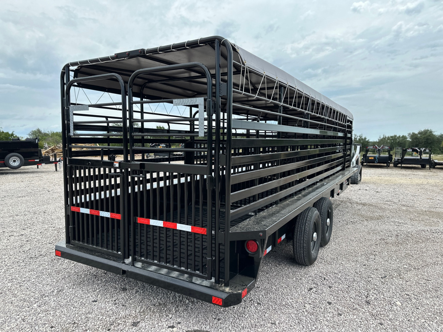 New 2026 Delco Bar Top 6'8 x 24' Stock Trailer