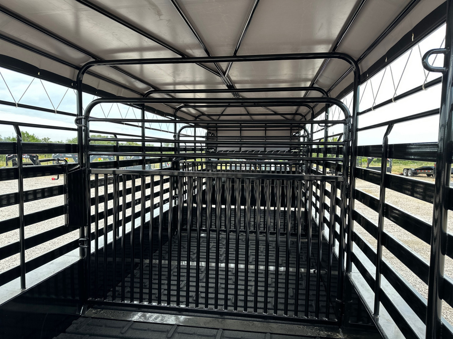 New 2026 Delco Bar Top 6'8 x 24' Stock Trailer