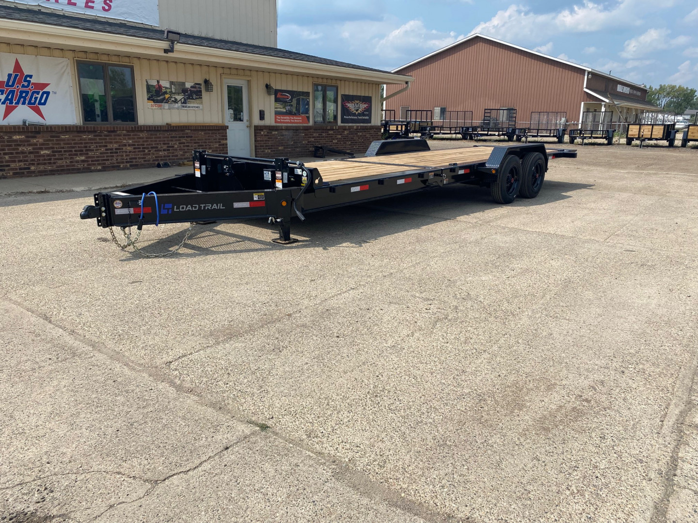 New 2025 Load Trail 83X24 Heavy Duty Gravity Tilt 20k w/Fork Holders Tilt Trailer