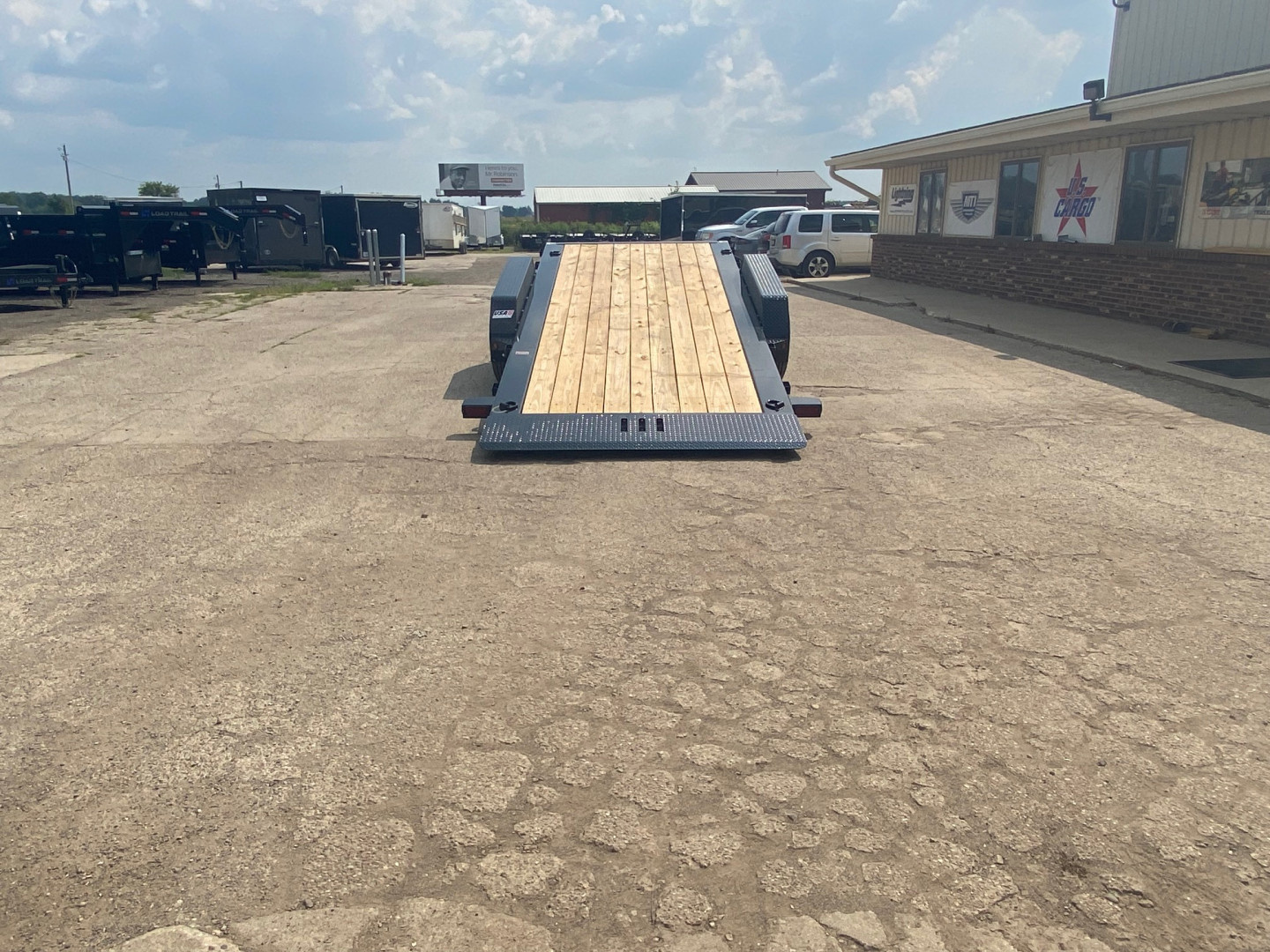 New 2025 Load Trail 83X24 Heavy Duty Gravity Tilt 20k w/Fork Holders Tilt Trailer