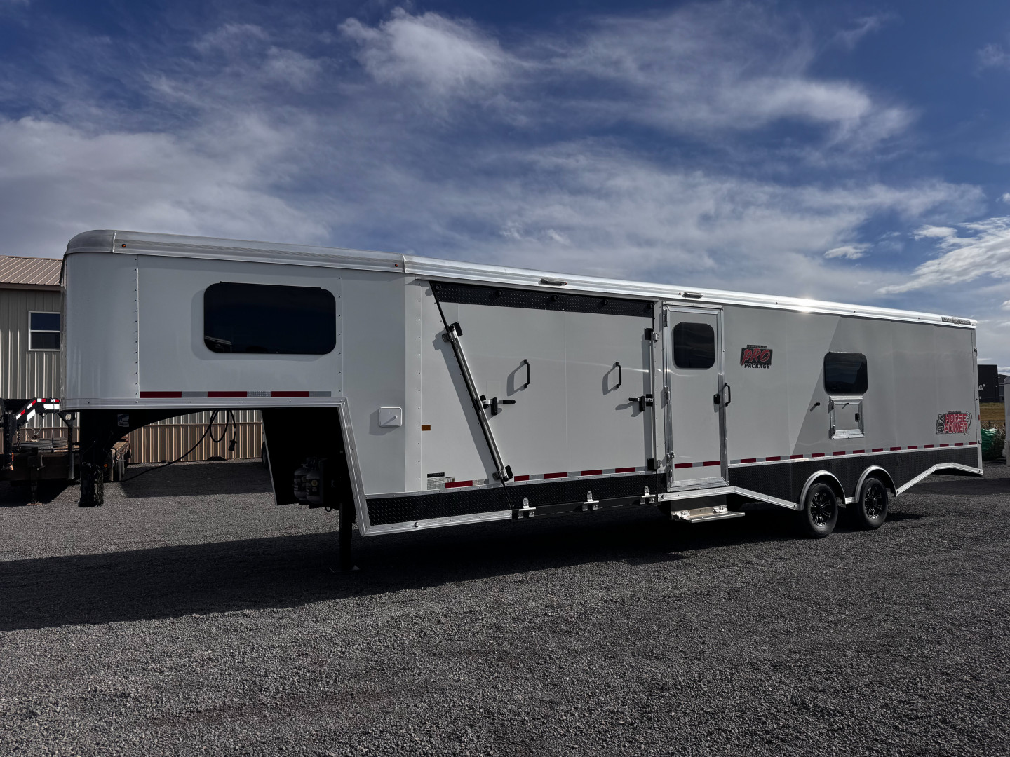 New 2025 Logan Coach 33' Horsepower Pro Package ATV Trailer