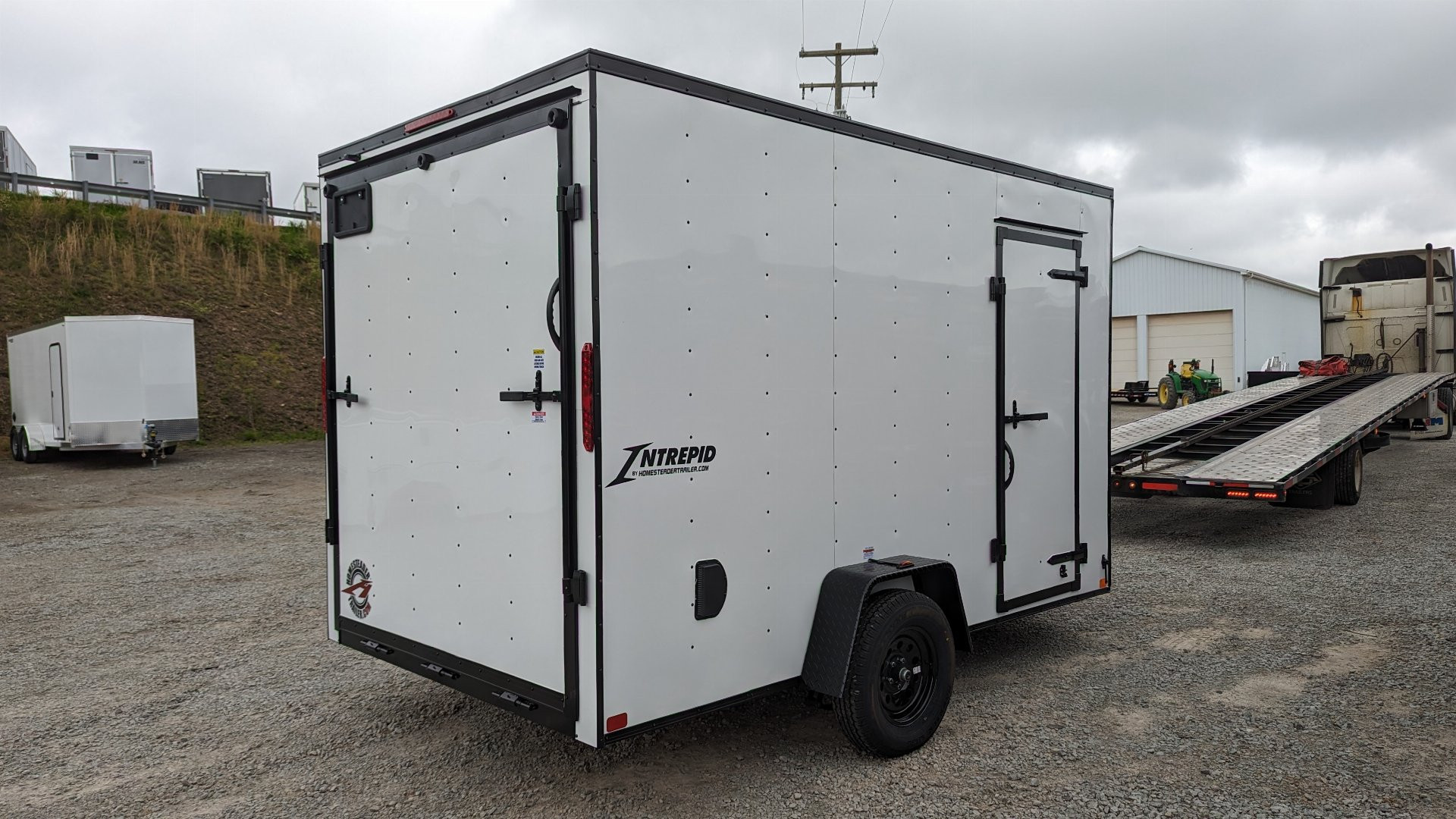 New 2026 Homesteader 7x12 Intrepid V-Nose Cargo Trailer w/ Ramp Door & BRAKES (84" INSIDE)