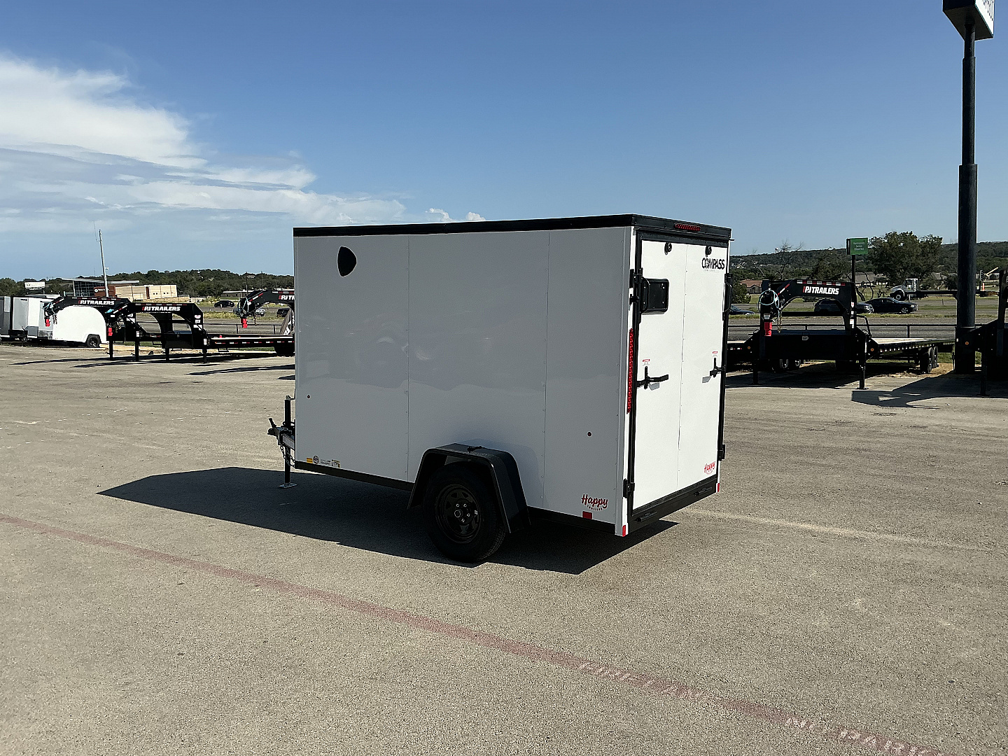 New 2026 Compass 5'x10' Enclosed Cargo Trailer - Indigo DLX