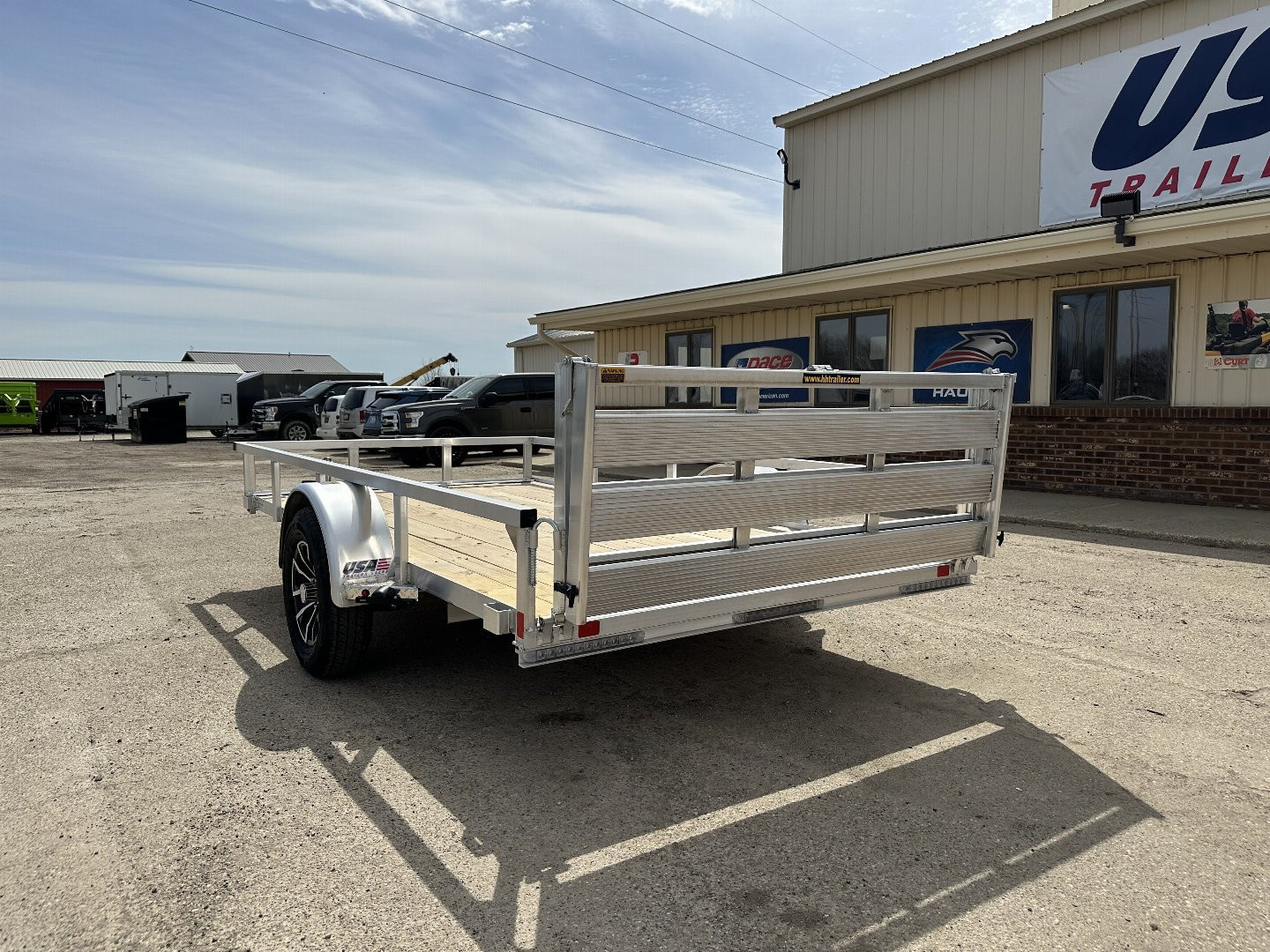 New 2025 H&H TRAILERS 76X12 Aluminum Landscape Trailer (Small Dent in Driver Fender)