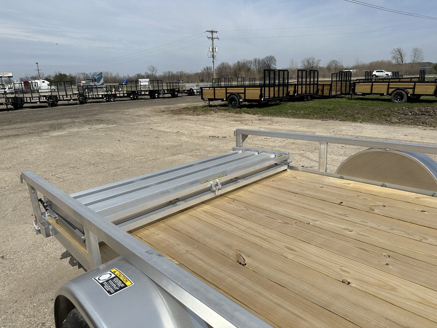 New 2025 H&H TRAILERS 76X12 Aluminum Landscape Trailer (Small Dent in Driver Fender)