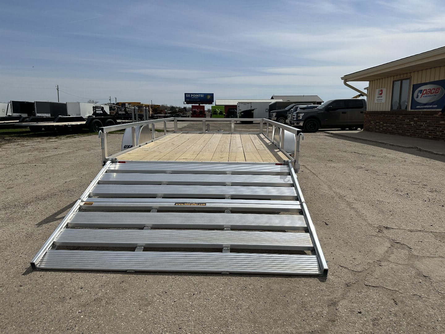 New 2025 H&H TRAILERS 76X12 Aluminum Landscape Trailer (Small Dent in Driver Fender)