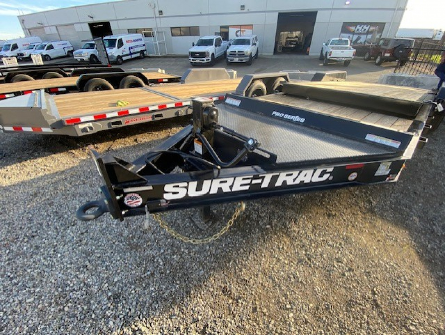 New 7x18+4 Tandem Axle 17.6K Tilt Trailer