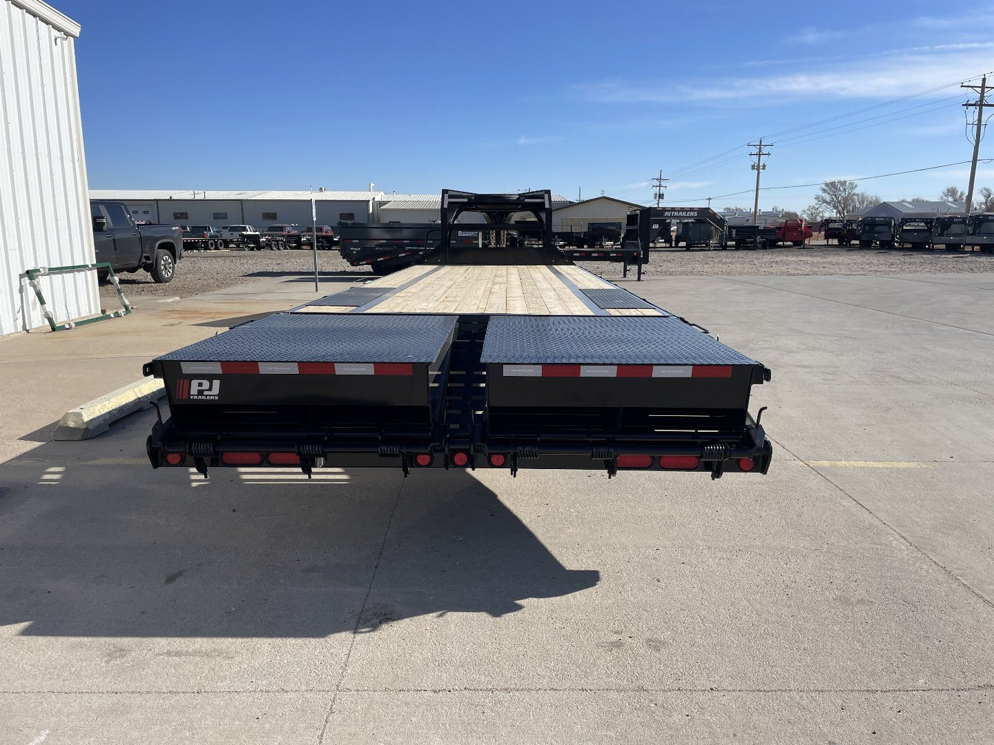 New 2026 PJ Trailers 28' X 102" Flatdeck 5' Dovetail With Monster Ramps Flatbed Trailer