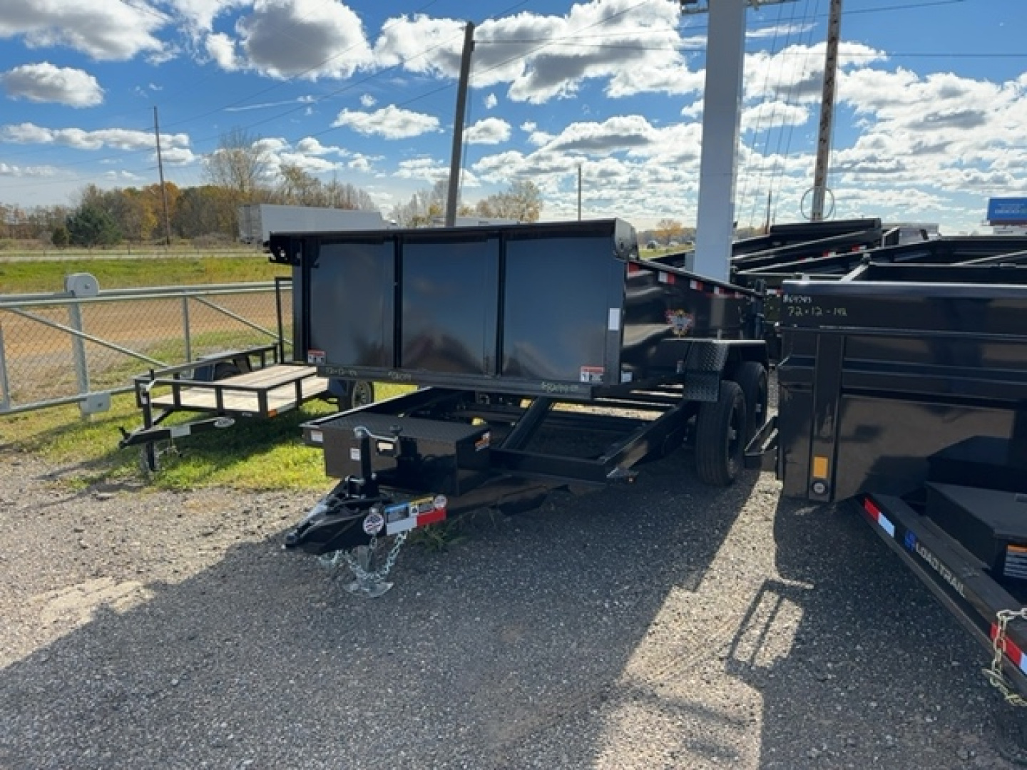 New 2025 H&H Trailers 76x12 Tandem Axle 10k w/2Ft Sides Dump Trailer