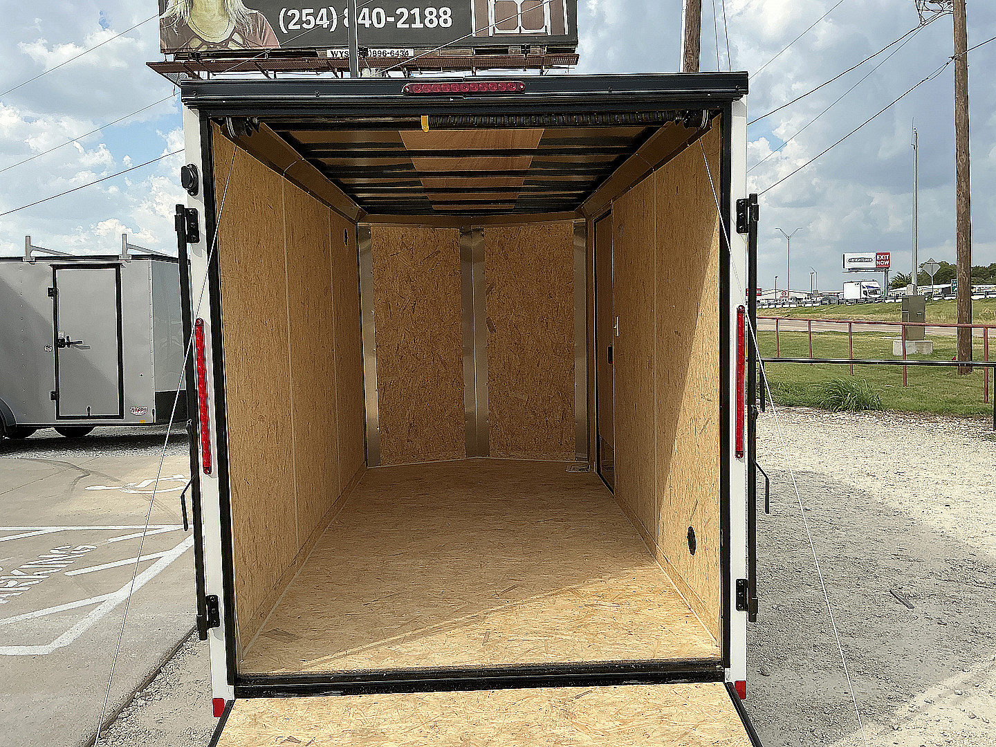 New 2026 Compass 6'x12' Enclosed Cargo Trailer - Indigo DLX