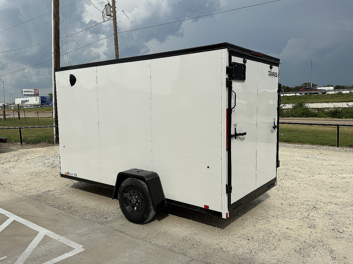 New 2026 Compass 6'x12' Enclosed Cargo Trailer - Indigo DLX