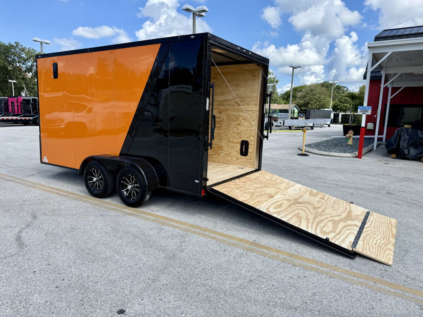 New 2026 Rock Solid Cargo 7x14 Rear Ramp Door 7K Orange & Black Polycore Black Out PKG Cargo / Enclosed Trailer
