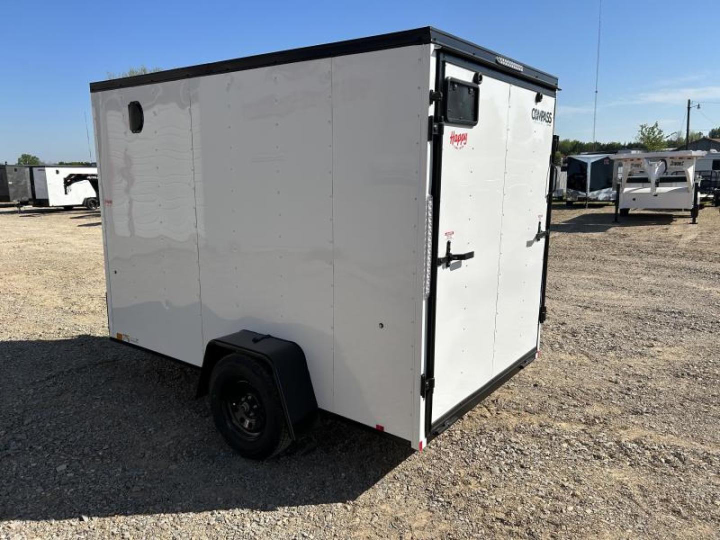 New 2026 Compass 6'x10' Enclosed Cargo Trailer - Indigo DLX