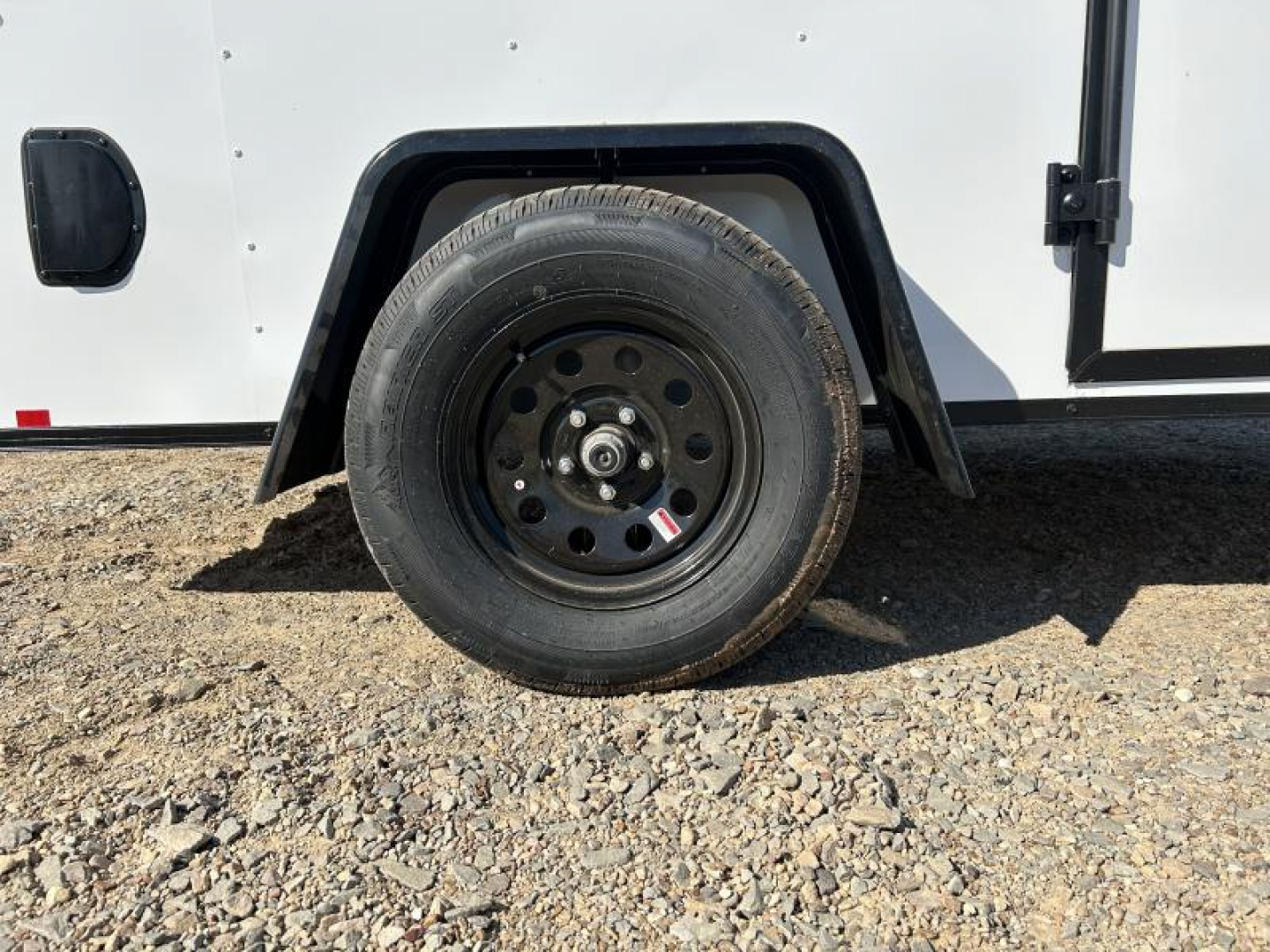 New 2026 Compass 6'x10' Enclosed Cargo Trailer - Indigo DLX