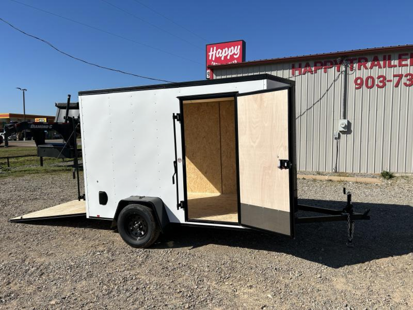 New 2026 Compass 6'x10' Enclosed Cargo Trailer - Indigo DLX