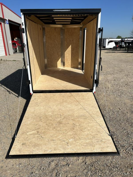 New 2026 Compass 6'x10' Enclosed Cargo Trailer - Indigo DLX