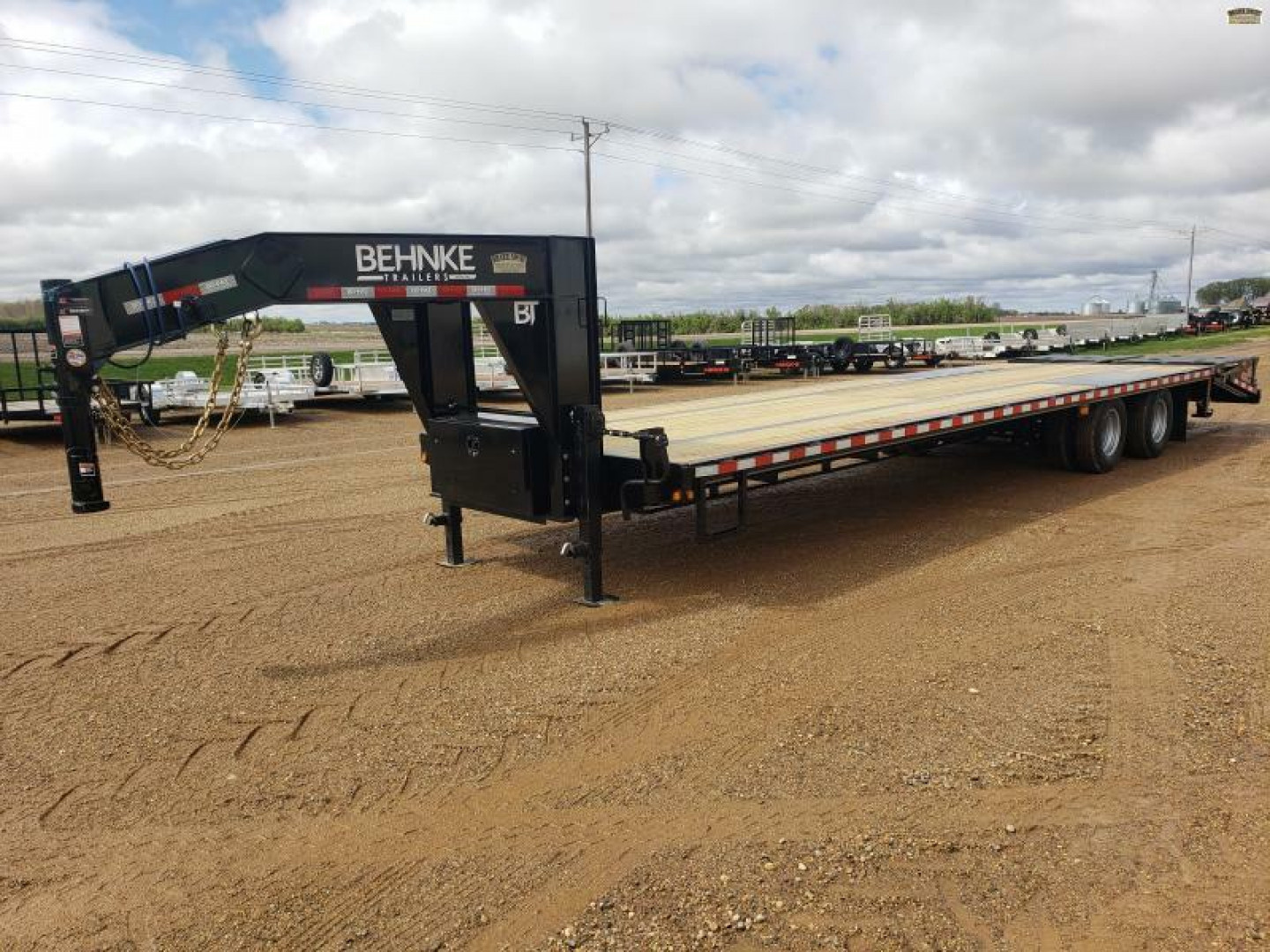 New 2024 Behnke FB8X33GN-24E Flatbed Trailer
