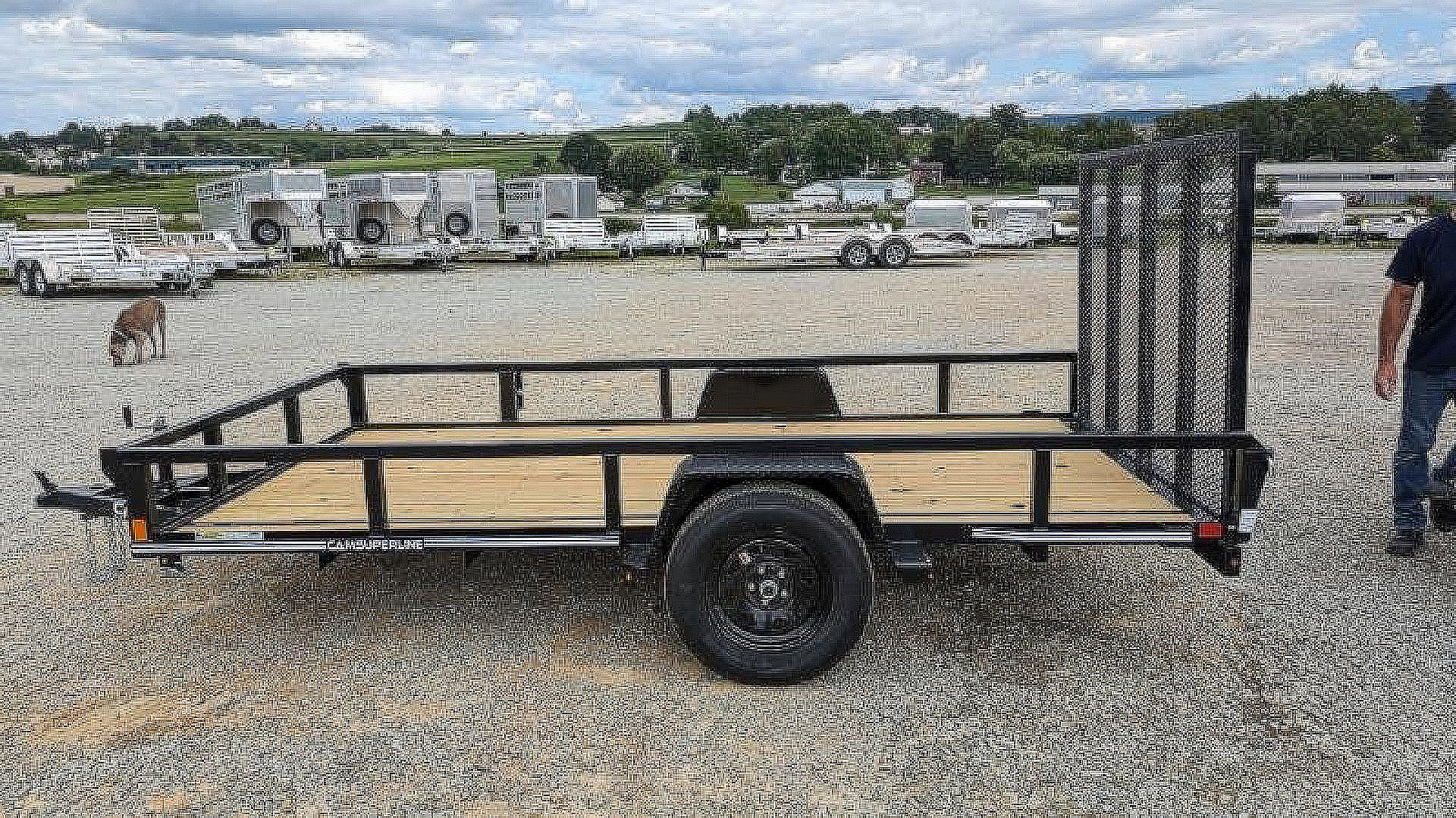 New 2025 CAM SUPERLINE 7x12 Tubular Top Rail Utility Trailer w/ Spring Assist Gate