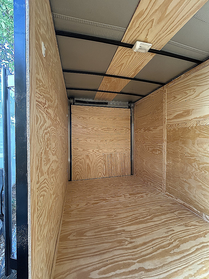 New 2025 Family Trailer 6x12 Tandem Axles Cargo / Enclosed Trailer-Screwless Exterior-Blackout Pkg.-RearSpoiler