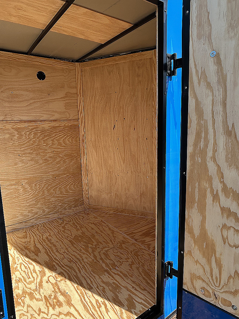 New 2025 Family Trailer 6x12 Tandem Axles Cargo / Enclosed Trailer-Screwless Exterior-Rear Spoiler-Balckout pkg.