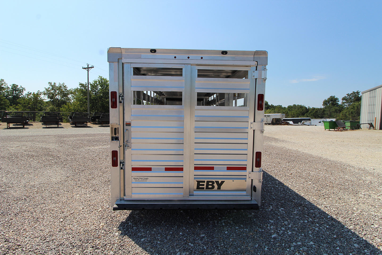 New 2026 EBY Trailers Maverick 6'11 x 24' Stock / Stock Combo Trailer