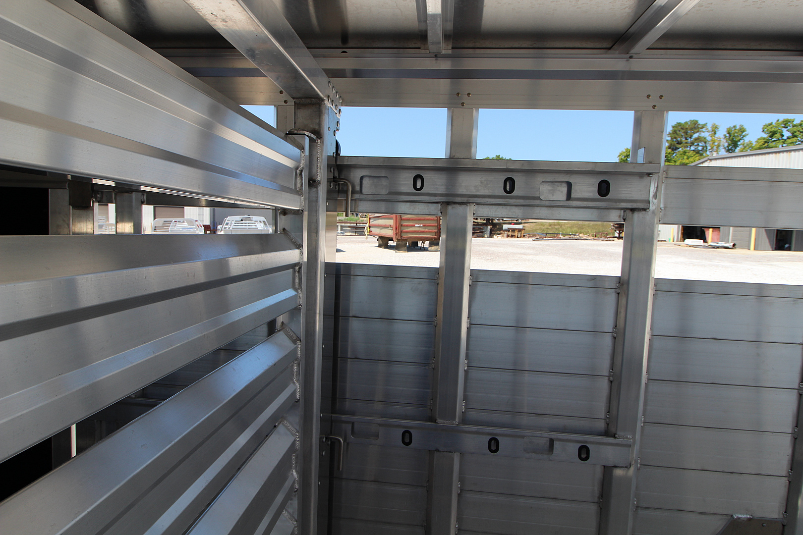 New 2026 EBY Trailers Maverick 6'11 x 24' Stock / Stock Combo Trailer