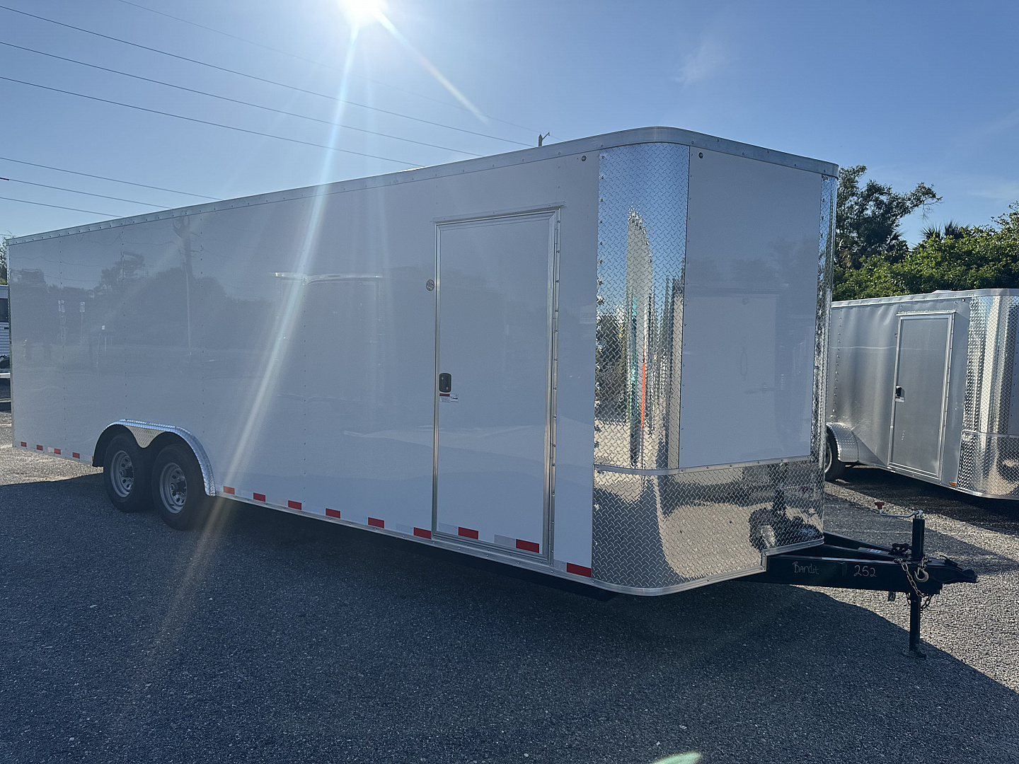 New 2026 Arising 8.5X24 TANDEM AXLE 10000 LB GVWR Cargo / Enclosed Trailer WITH .080 WHITE COMPOSITE EXTERIOR, 7FT INTERIOR HEIGHT, REAR RAMP DOOR, FULL TUBULAR FRAME