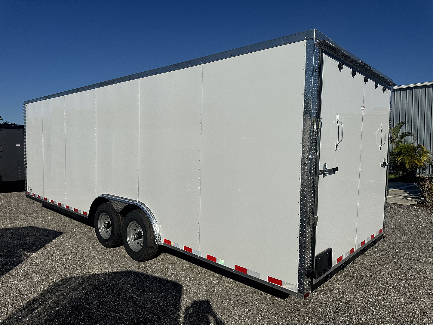 New 2026 Arising 8.5X24 TANDEM AXLE 10000 LB GVWR Cargo / Enclosed Trailer WITH .080 WHITE COMPOSITE EXTERIOR, 7FT INTERIOR HEIGHT, REAR RAMP DOOR, FULL TUBULAR FRAME