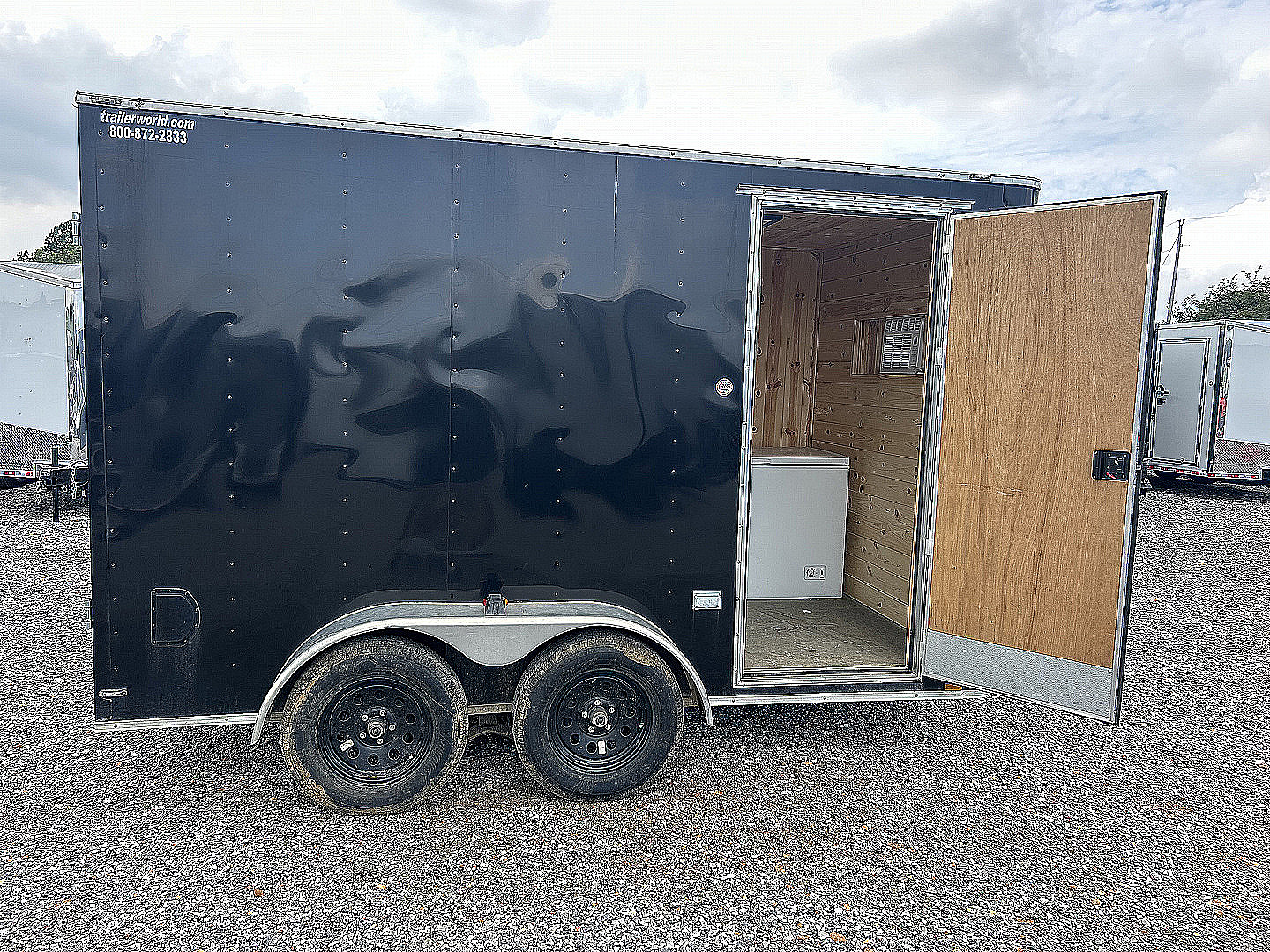 Used 2022 Lark 7'x12' Custom Freezer Enclosed Trailer