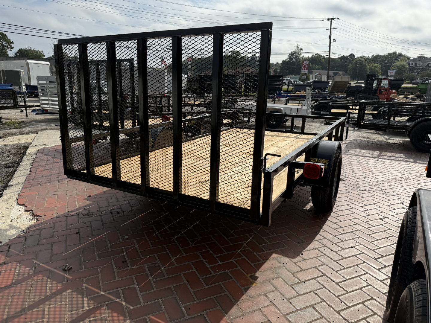 New 2025 P & T Trailers 6.4X12 AFG TUBE (SPRING ASSIST) Utility Trailer