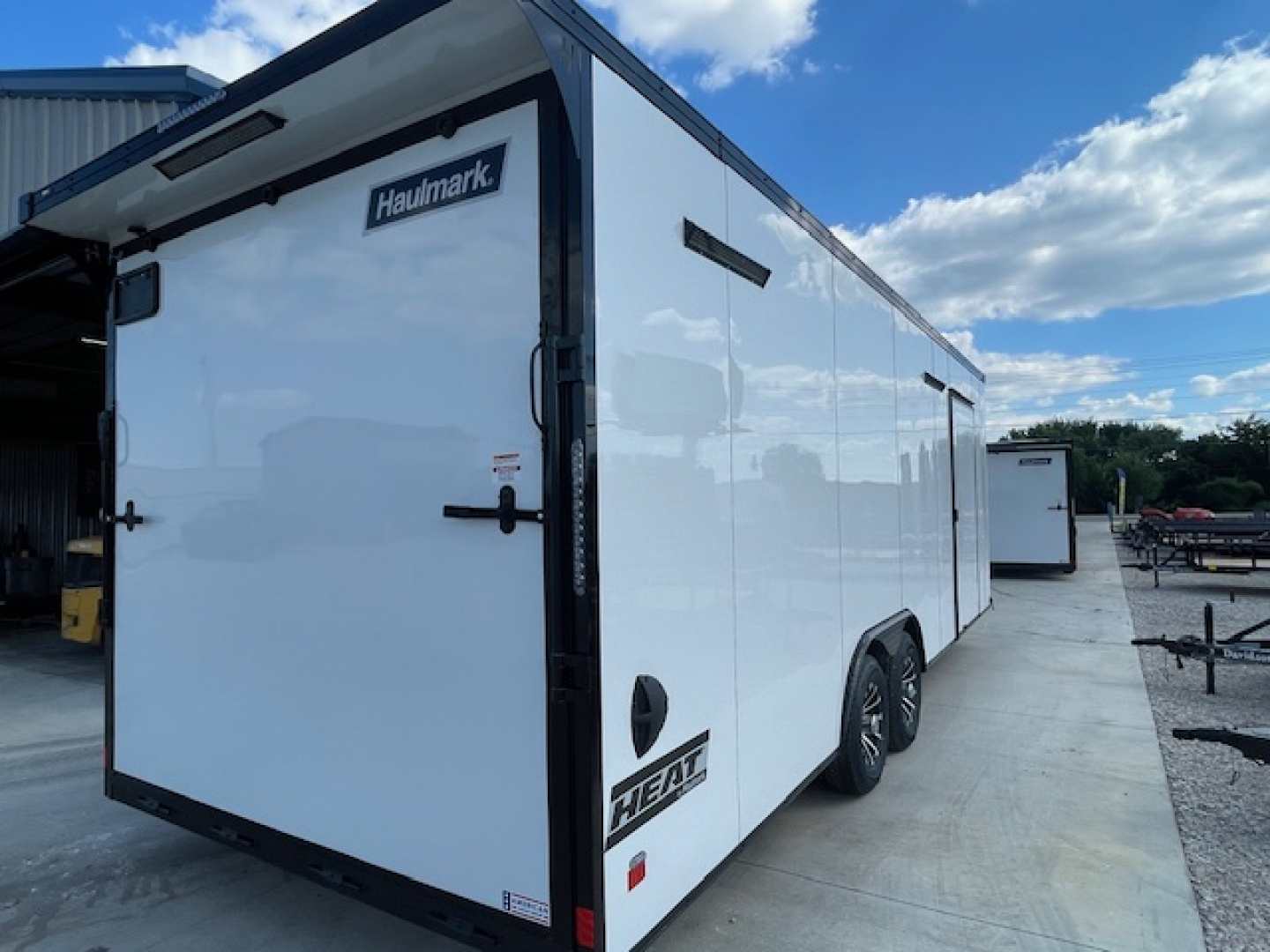 New 2026 HAULMARK HEAT 8'6" X 24' TANDEM (2) 5200lb AXLE ENCLOSED RACE CAR HAULER
